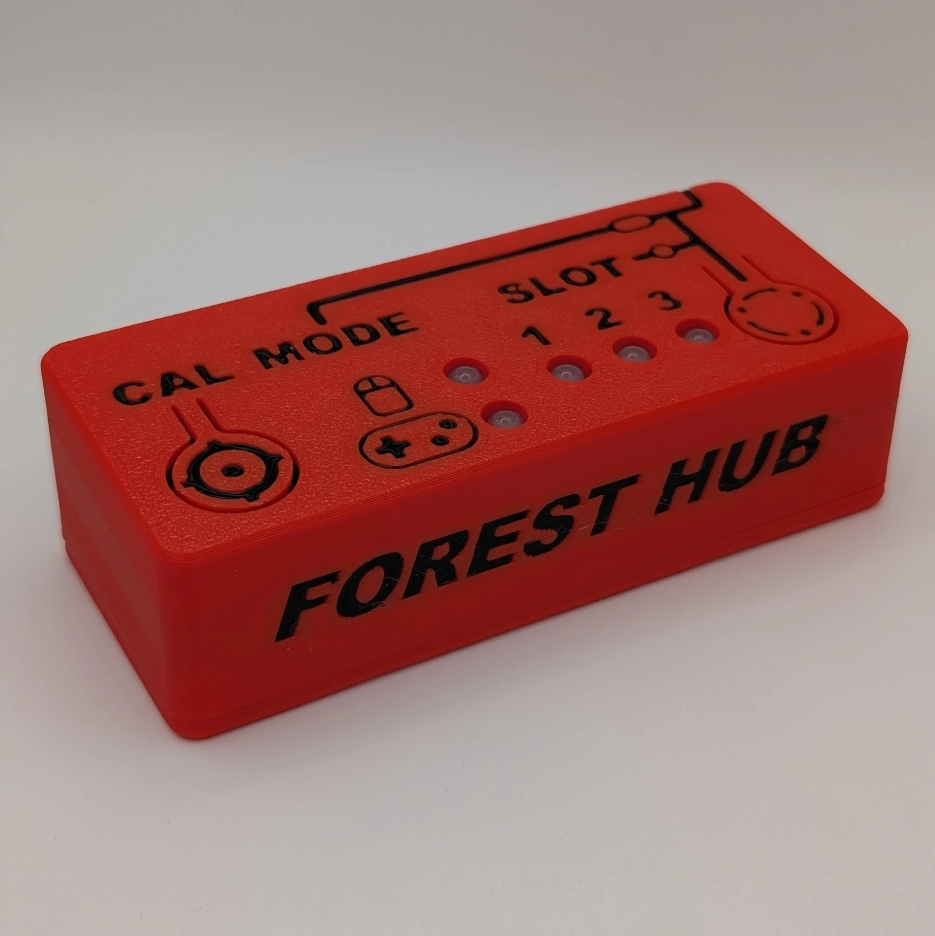 Forest Joystick Mouse Hub, a red 3D printed box labelled Forest Hub with slot indicator lights
